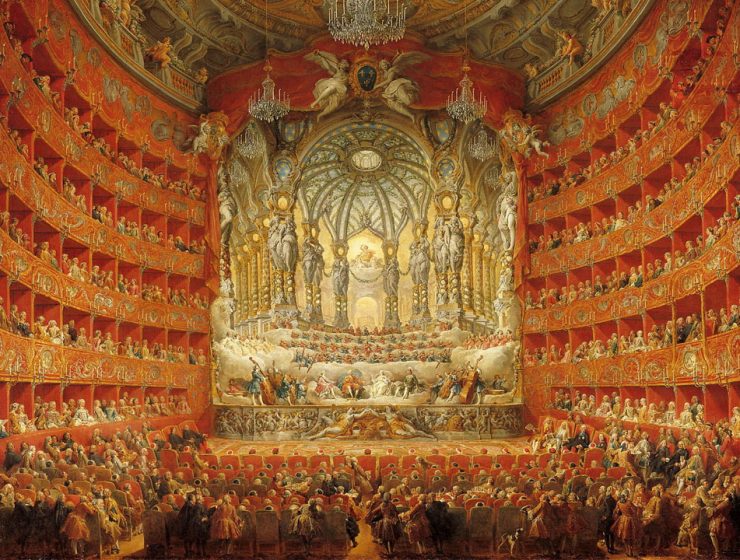 Teatro d’opera storico con orchestra e pubblico, simbolo della musica classica italiana